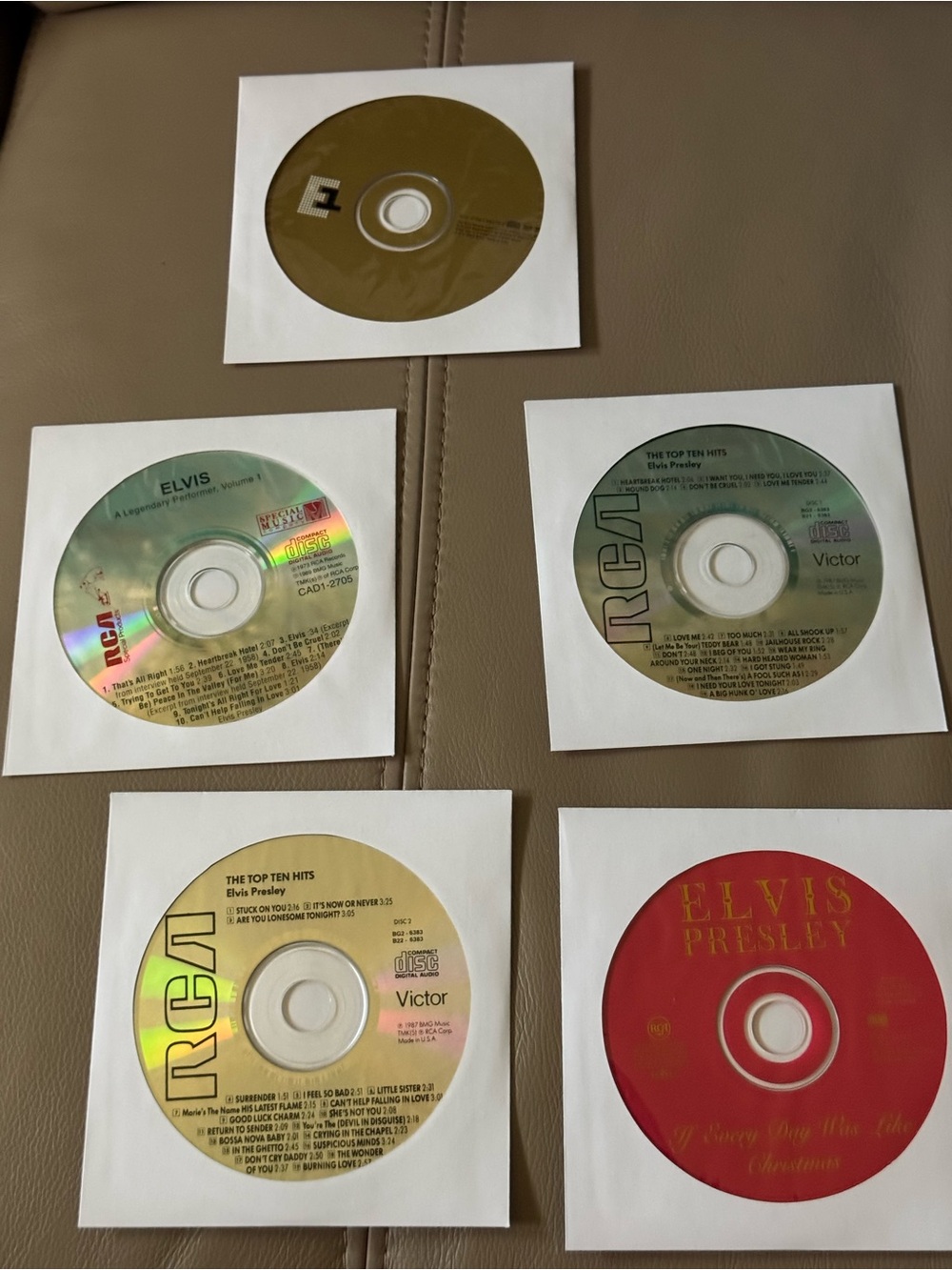 Elvis Presley 5 CD collection.    No jewel cases.    Mint condition.